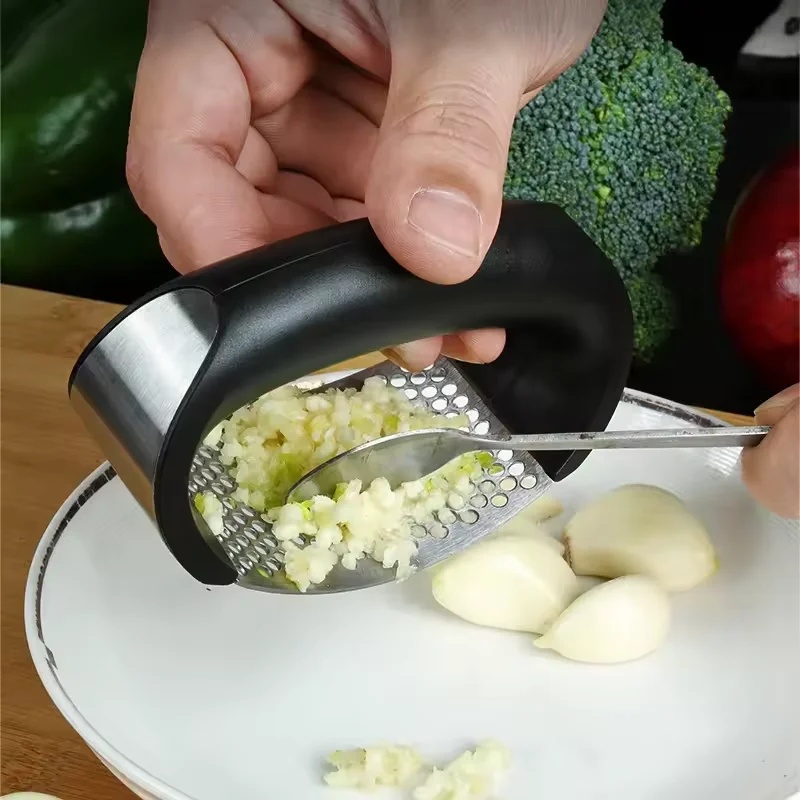 Handheld Press Garlic Crusher  - Kitchen Hanging Gadgets review and price