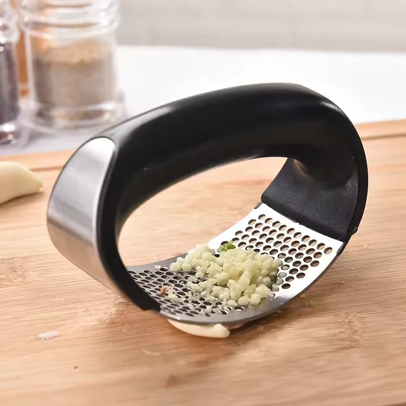 Handheld Press Garlic Crusher  - Kitchen Hanging Gadgets review and price